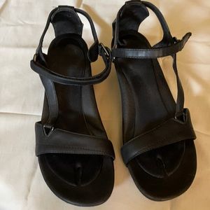 Black Teva wedged sandals. Size 9